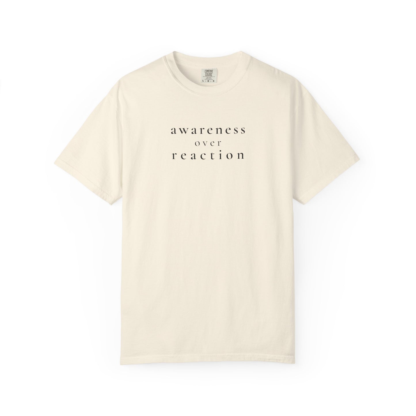 awareness over reaction tee